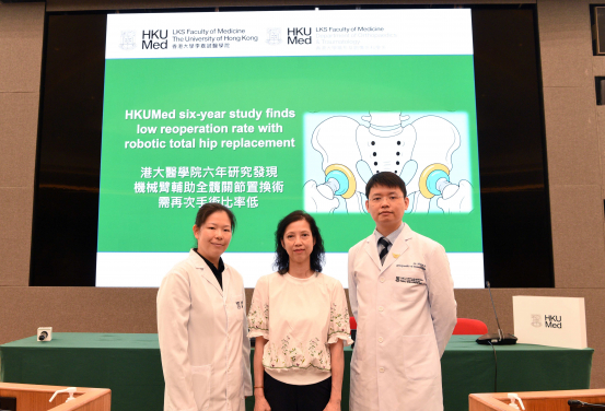 Dr Henry Fu Chun-him (right) highlights that increased experience has progressively shortened the surgery time of robotic total hip replacement. Ms Lai (middle), a patient who has recovered after the robotic surgery, shares that the robotic surgery helps her regain mobility and return to normal life.
 